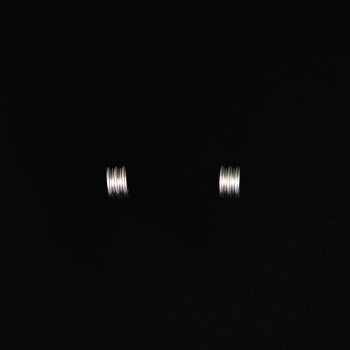 Aries Huggie Earrings in Silver