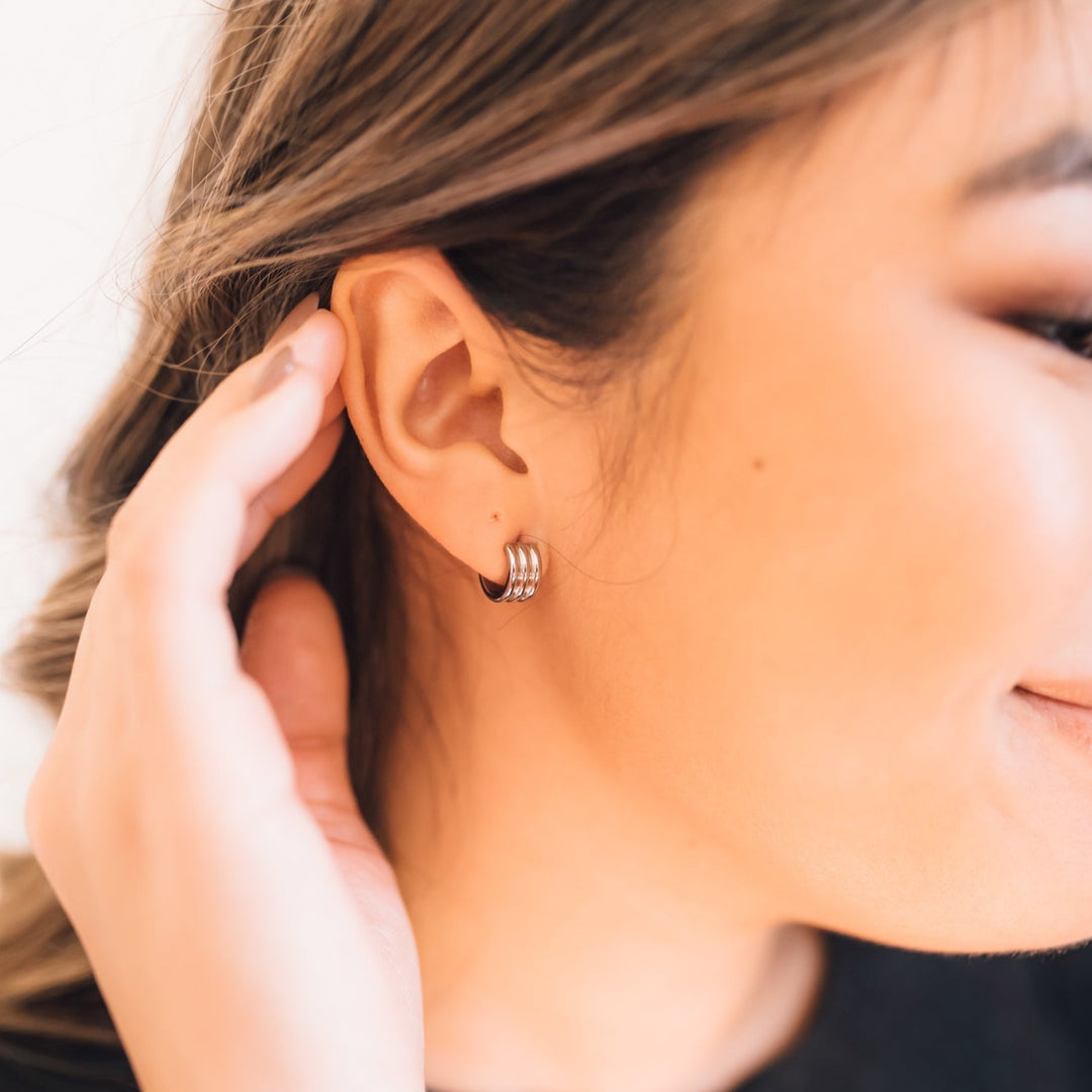 Aries Huggie Earrings in Silver