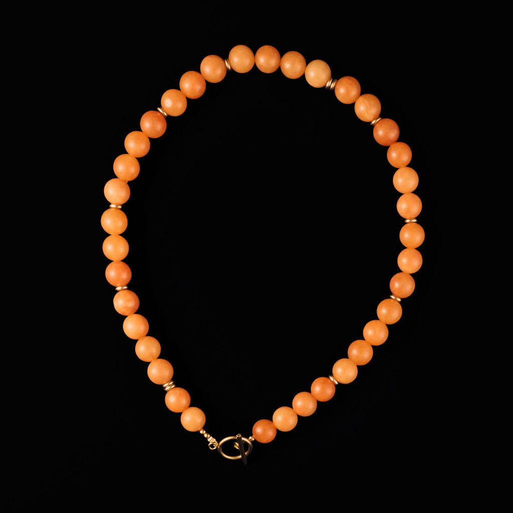 16-inch orange chalcedony beaded necklace with toggle closure