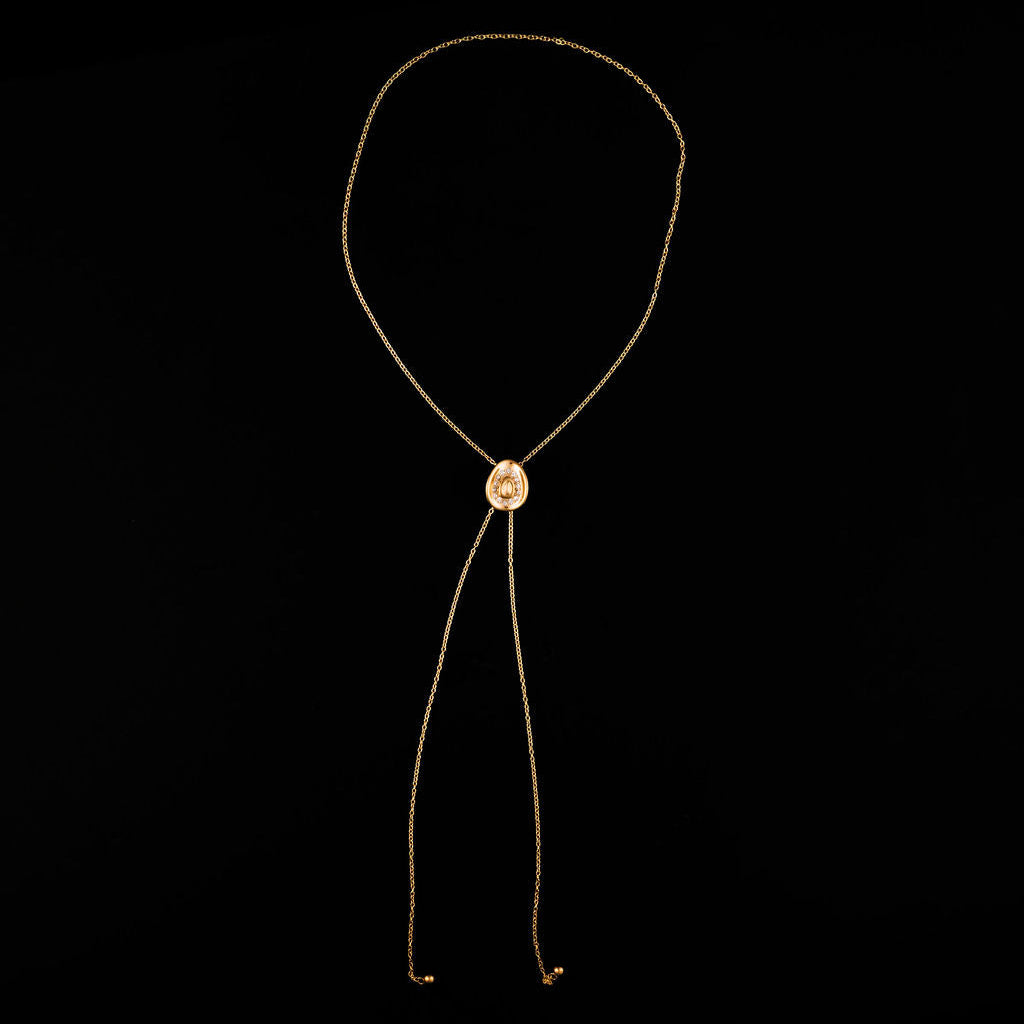 30-inch gold bolo tie necklace with cowboy hat and glass stone detail