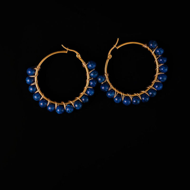 2-inch gold hoop earrings with wire-wrapped lapis beads