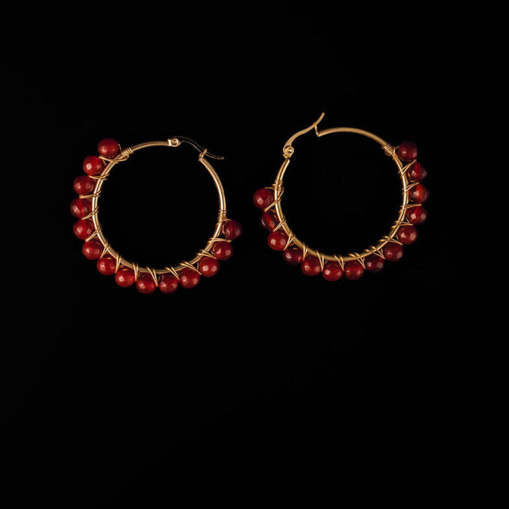  2-inch gold hoop earrings with wire-wrapped red jasper beads