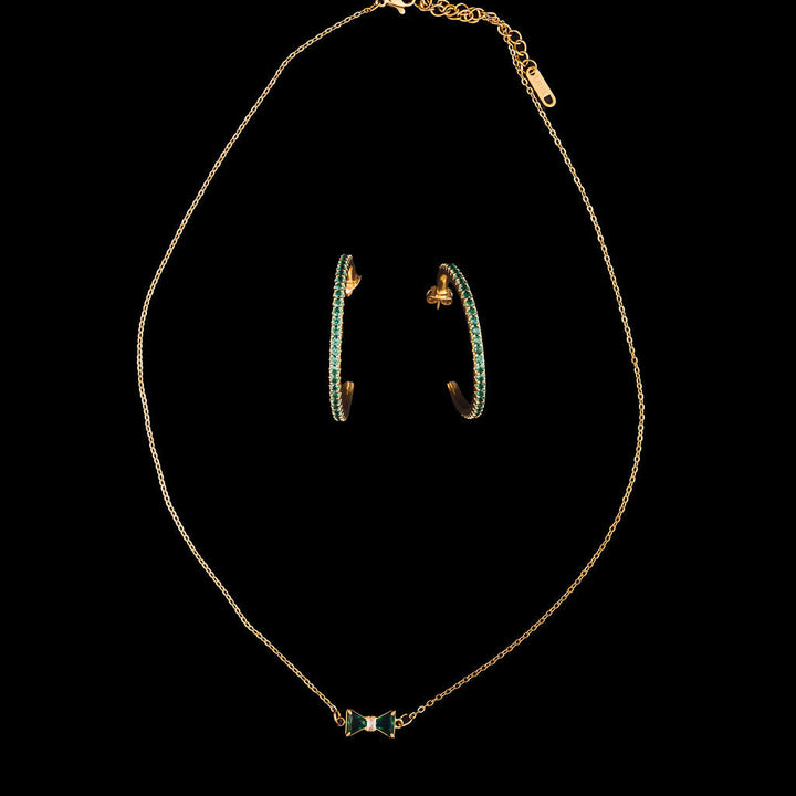 Jewelry set with necklace and earrings on a black background